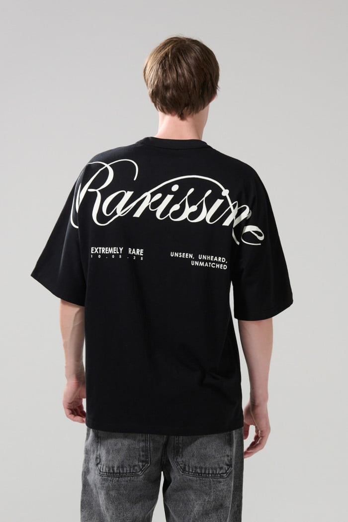 Camiseta unicolor oversize manga corta con textos